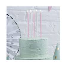 Pink and white glitter candles with holders