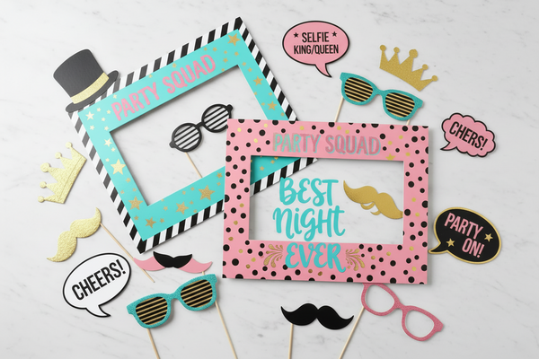 Playful flat lay composition of party photo frames and photo booth props. Large rectangular paper and foil photo frames designed to be held in hands for party photos. No people. Color palette: turquoise, black, white, medium-saturated rose pink, gold accents. Soft white marble background with scattered confetti. Fun, lively party atmosphere, not wall frames, not home decor.